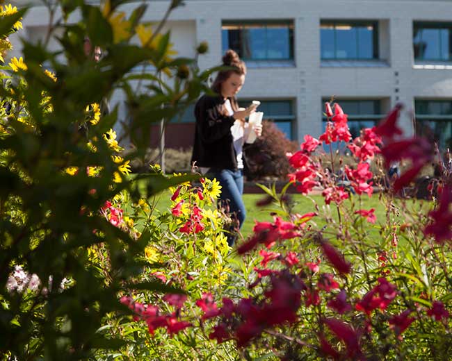 student walking on campus